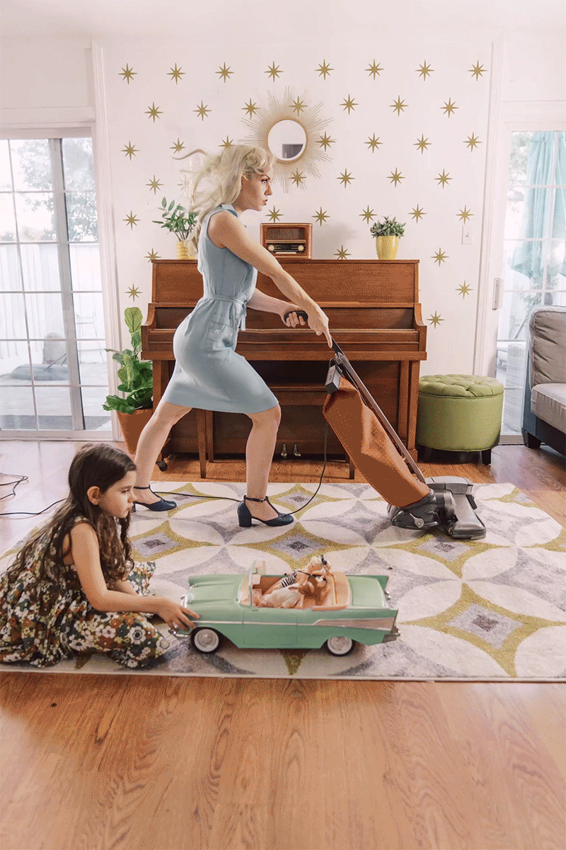 tenleyclark-sonyalphafemale-undertheweather-wind Cinemagraph of a mother vacuuming while little girl plays on rug