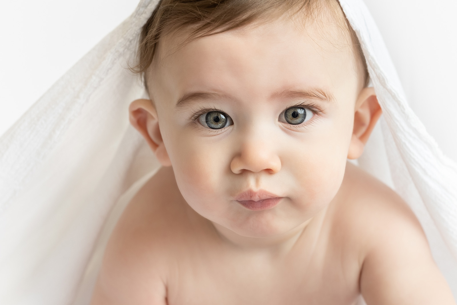 Close up photo of 8 month old baby boy