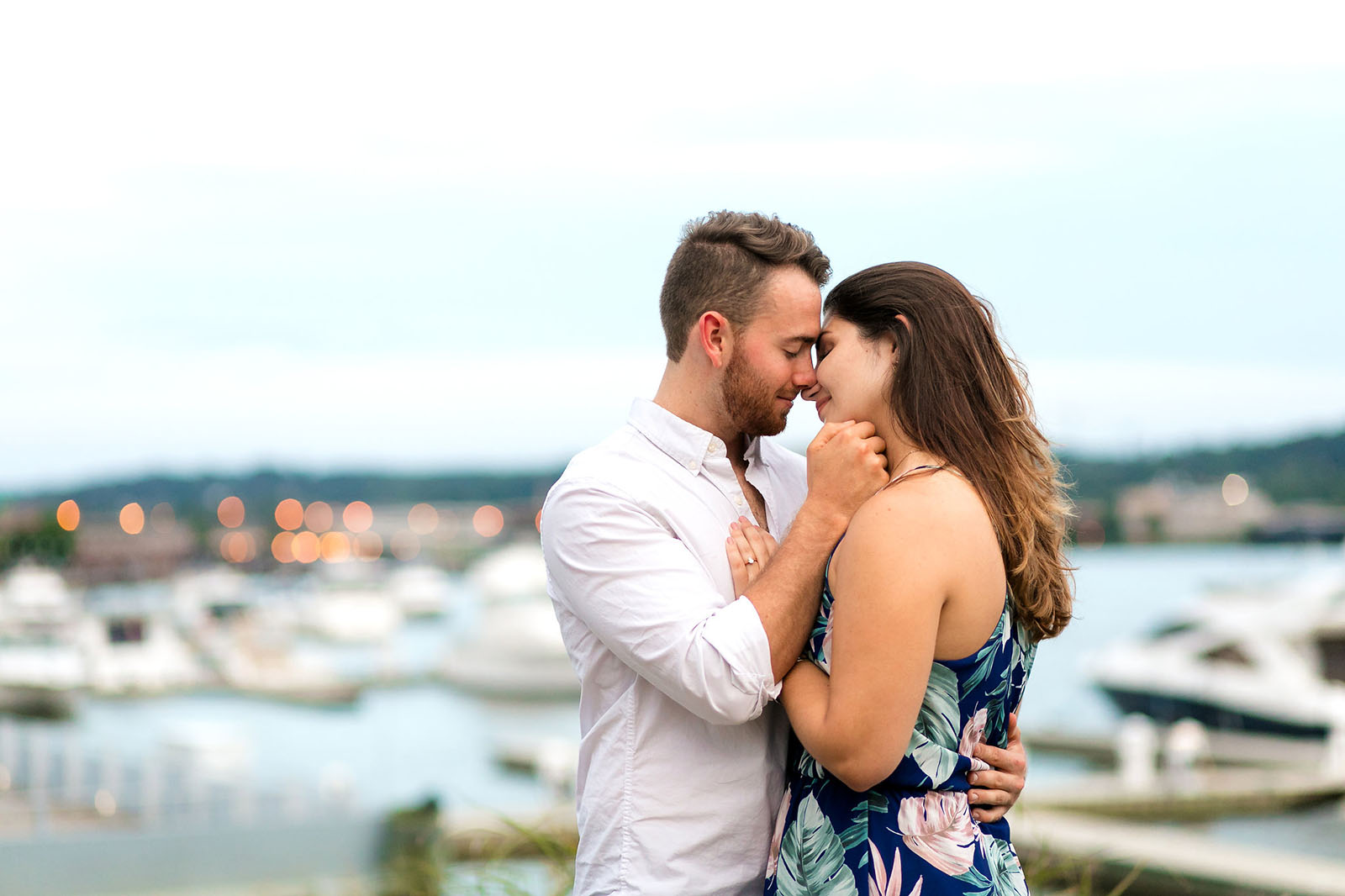 Couple kissing at engagement session, photography pricing