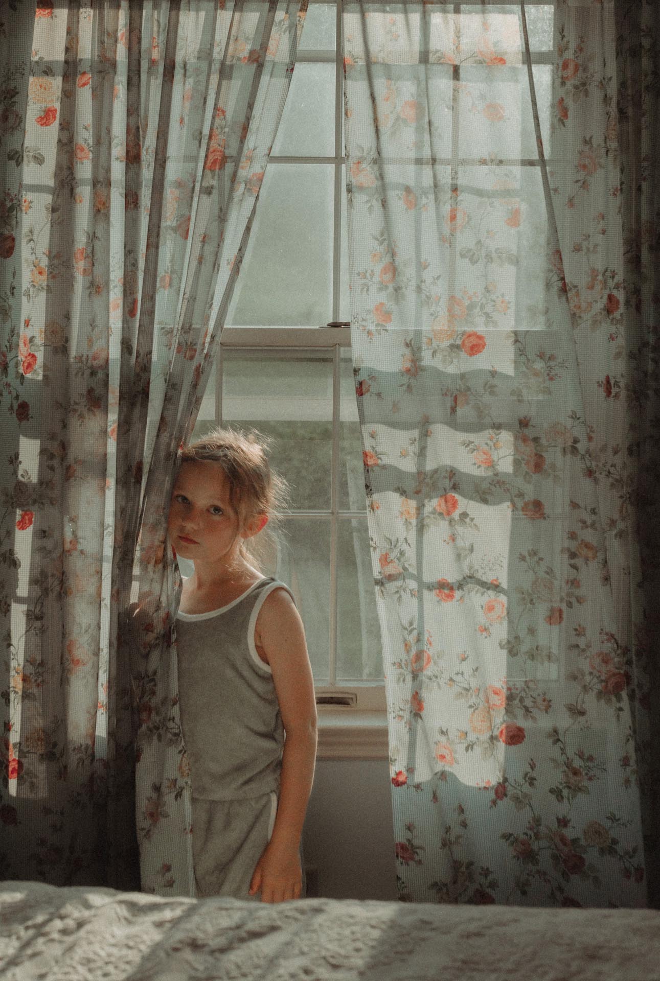 Best portrait photographer image of girl and curtains