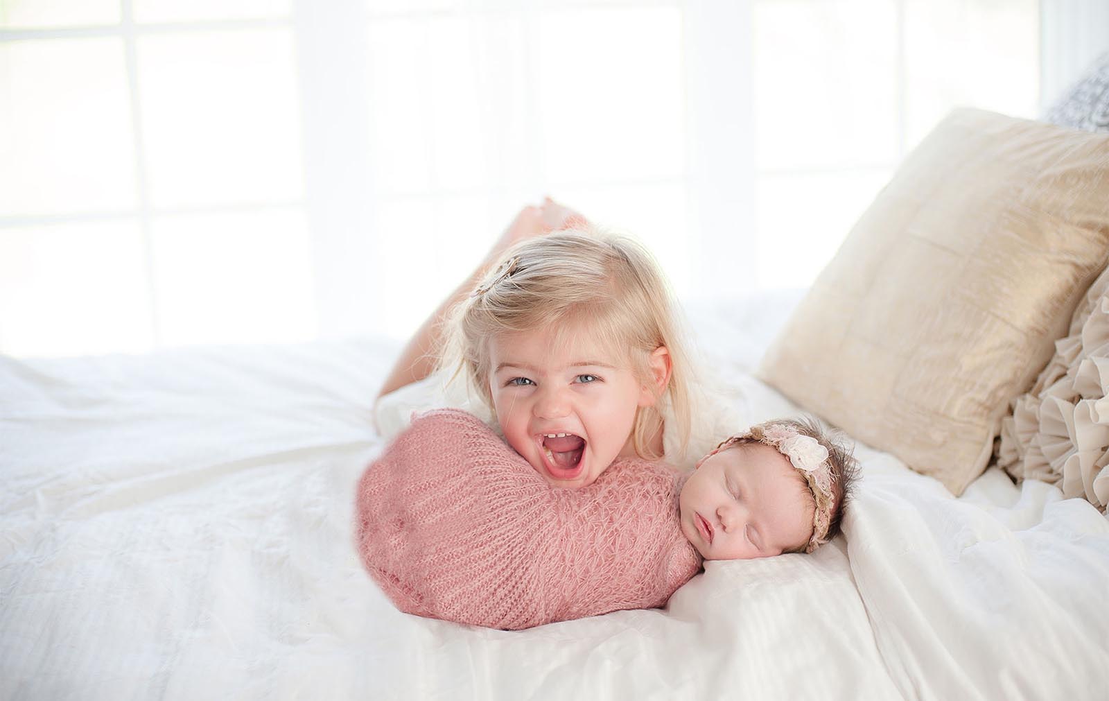 exceptional-client-experience-photography-18 Photo of a toddler sibling with a newborn