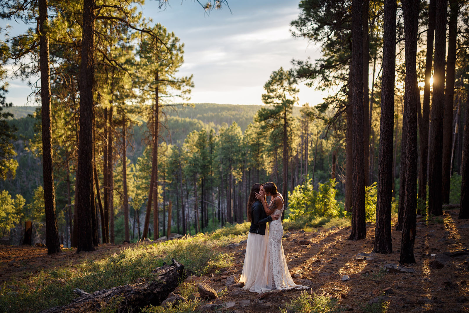 Makayla McGarvey 1 @makayla_mcgarvey_photography love in the time of covid Photo of a Covid wedding in the woods, a couple kisses