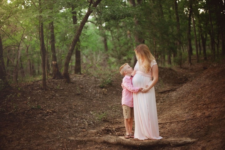 photo of a pregnant woman with her son by Erica Williams
