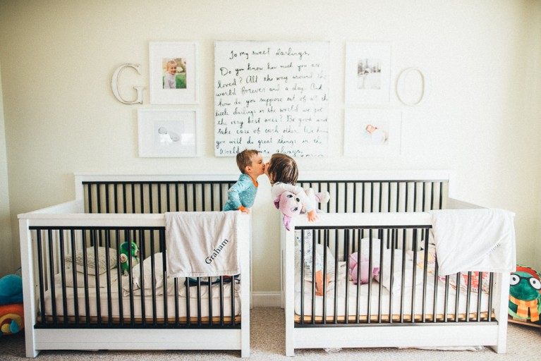 picture of two toddlers in their cribs by Elise Meader