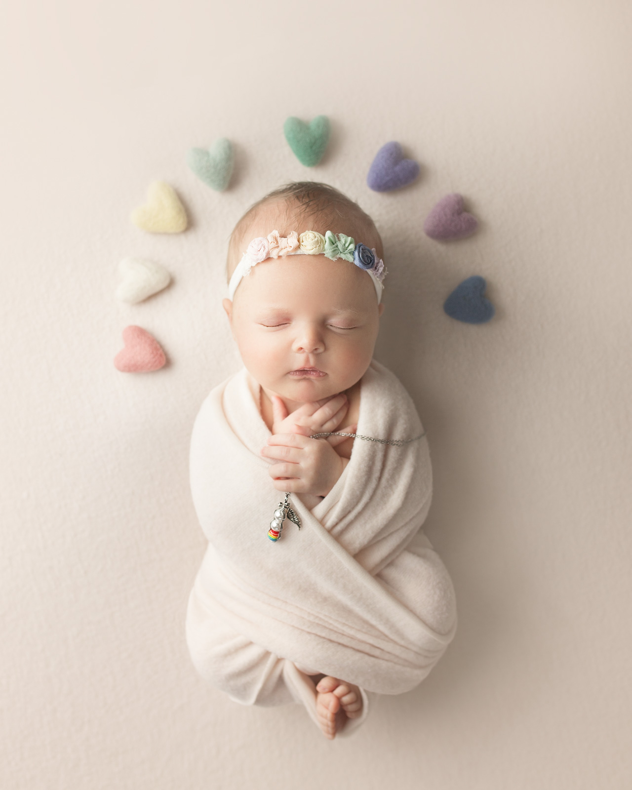 rainbow-baby-newborn-photography-crystal-reddick-2 newborn baby photo with rainbows above babies head