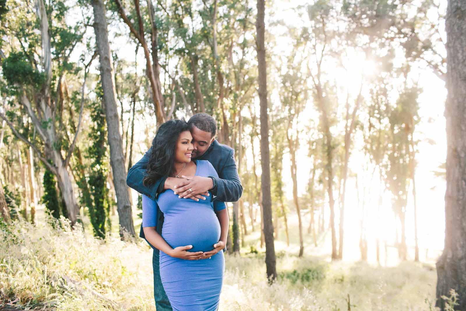 Travel photo of a couple hugging in woods
